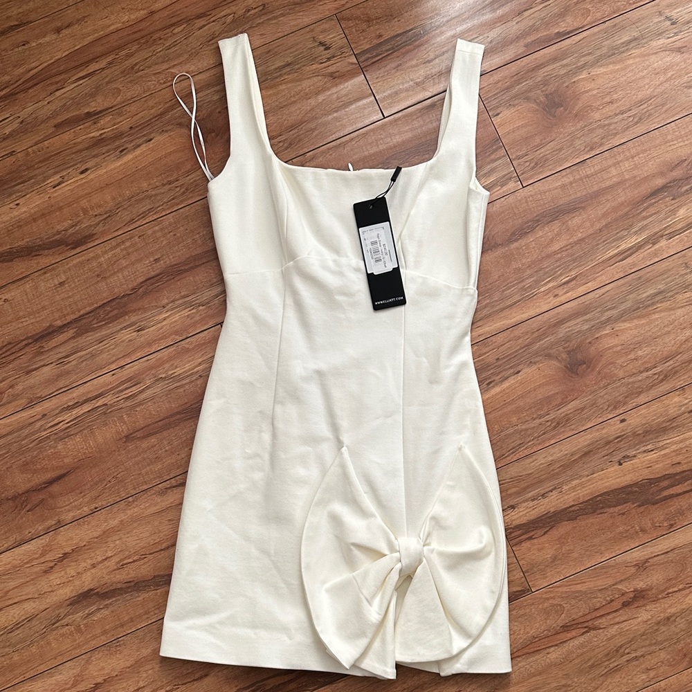 Elegant Cream Dress with Bow Detail